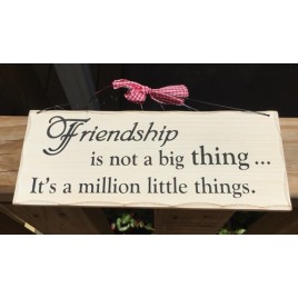 WP323-Friendship is not a big thing...it's a millon little things 